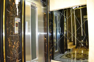 a room with a glass door with gold designs at Bona Sera Hotel in Istanbul