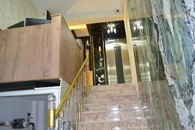 a staircase in a building with a glass wall at Bona Sera Hotel in Istanbul