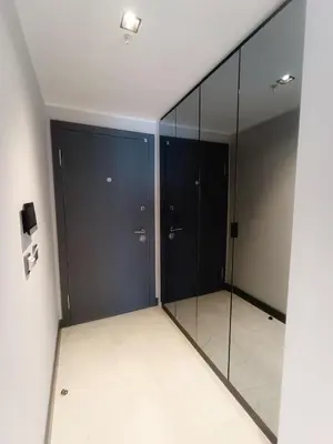 a room with black glass doors and a tile floor at Luxury Central Fully Equipped 3BR 2BA Apartment by Siena Suites in Istanbul