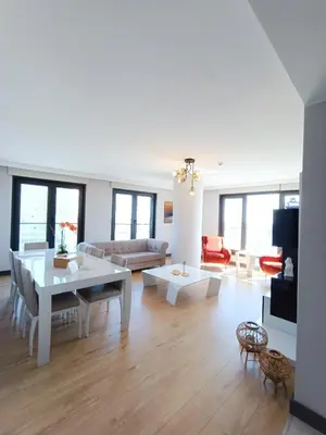 a living room with a couch and a table at Luxury Fully Equipped 3BR 2BA Apartment by Siena Suites in Istanbul