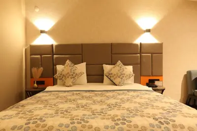 a bedroom with a large bed with two pillows at İncipark Hotel in Sakarya