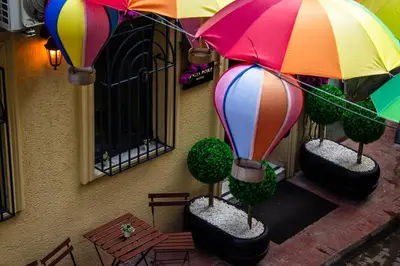 an overhead view of a hot air balloon with plants and umbrellas at Genoa Port Hotel in Istanbul
