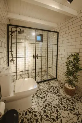 a bathroom with a shower with a toilet in it at Lemoon House Sapanca in Sapanca
