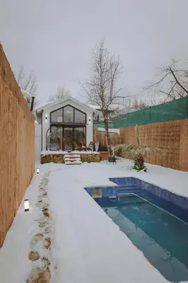 a house with a swimming pool in the snow at Lemoon House Sapanca in Sapanca