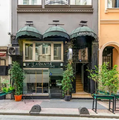 a store front of a building with plants in front at Lavanta Hotel in Istanbul