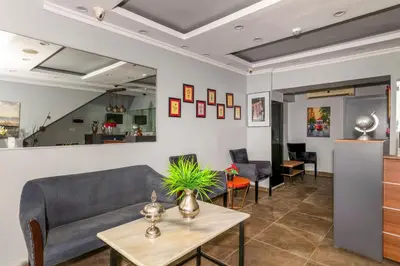 a living room with a couch and a table at Lavanta Hotel in Istanbul