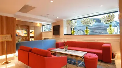 a lobby with a couch and chairs and a table at Dosso Dossi Hotels Old City in Istanbul