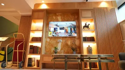 a room with a wall with a tv on it at Dosso Dossi Hotels Old City in Istanbul