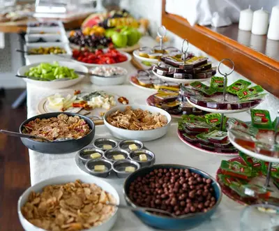 a buffet with many different types of food on a table at Loop Hotel Bosphorus İstanbul in Istanbul