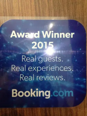 a sign that says award winner guestsreal experiencesreal reviewsboxing at Istanbul Central Hotel in Istanbul