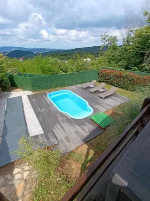a swimming pool sitting on top of a wooden deck at ME-GA Glamping in Sapanca