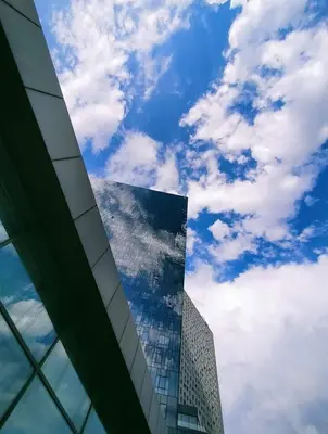 a tall glass building with the sky in the background at My G yoo Apartment #2 in Istanbul