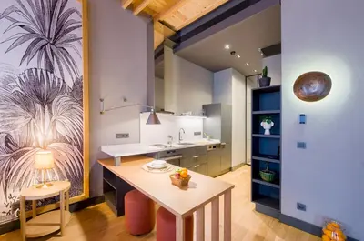 a kitchen with a table and a sink at Art Pera Suites in Istanbul