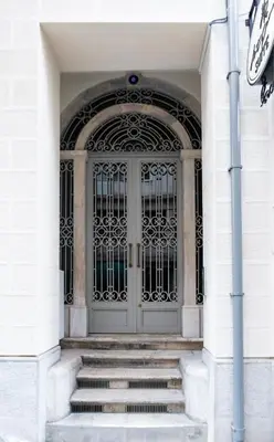 a door to a building with stairs in front at Art Pera Suites in Istanbul