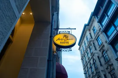 a sign on the side of a building at Art Pera Suites in Istanbul