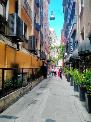 a city street with people walking down the street at 2 bedrooms central area located appartment 2 floor in Istanbul