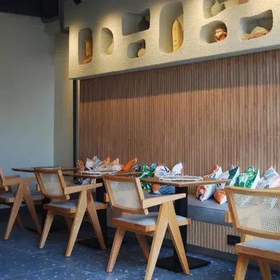 a row of tables and chairs in a restaurant at Four Sides Beyoglu in Istanbul