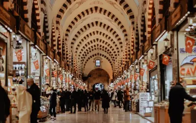 a crowd of people walking through a market hall at Eresin Hotels Topkapı in Istanbul