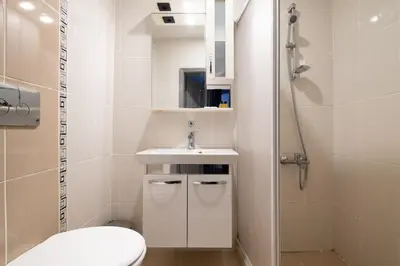 a small bathroom with a sink and a toilet at Sur Hotel Sultanahmet in Istanbul