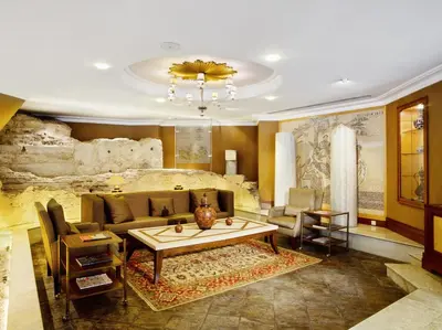 a living room with a couch and a table at Eresin Hotels Sultanahmet - Boutique Class in Istanbul