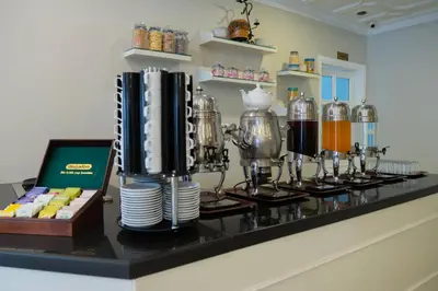 a counter with a coffee machine on it at Avicenna Hotel Sultanahmet in Istanbul