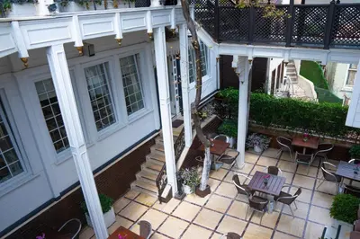 an overhead view of a patio with chairs and tables at Avicenna Hotel Sultanahmet in Istanbul