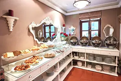 a breakfast room with a lot of food on display at Celal Sultan Hotel Special Class in Istanbul