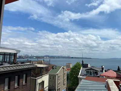 a view of the water from a city with buildings at Hanedan Hotel in Istanbul