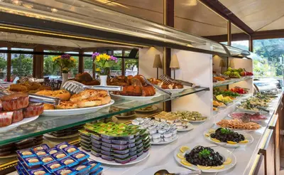 a buffet with a lot of food on display at Zeynep Sultan Hotel in Istanbul