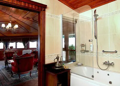 a bathroom with a bath tub in a room at Dersaadet Hotel Istanbul in Istanbul