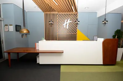 an office with a desk and a table at Holiday Inn Istanbul City by IHG in Istanbul