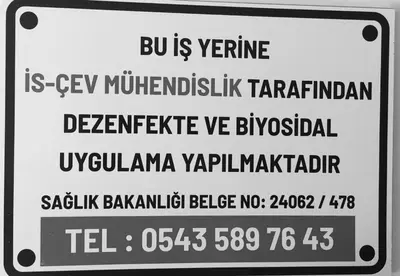a white sign with black writing on it at Star Holiday Hotel in Istanbul