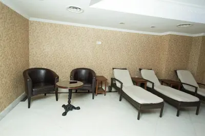 a waiting room with chairs and a table at Topkapi Inter Istanbul Hotel in Istanbul