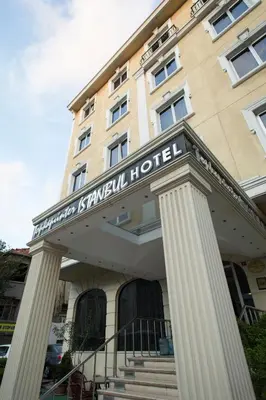 a hotel with columns in front of a building at Topkapi Inter Istanbul Hotel in Istanbul