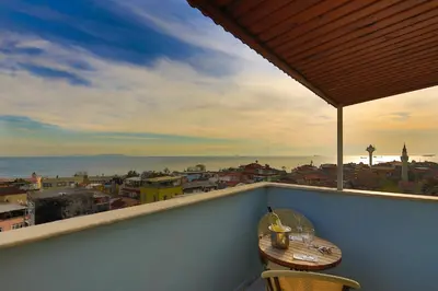 a balcony with a table and a view of the city at Hotel Historia-Special Category in Istanbul