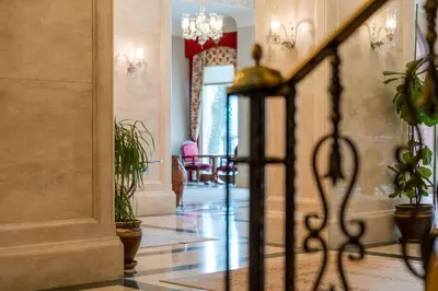 a hallway of a building with a chandelier at Hotel Sultanhan - Special Category in Istanbul