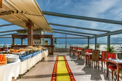 a view of a restaurant with tables and chairs at Hotel Sultanhan - Special Category in Istanbul