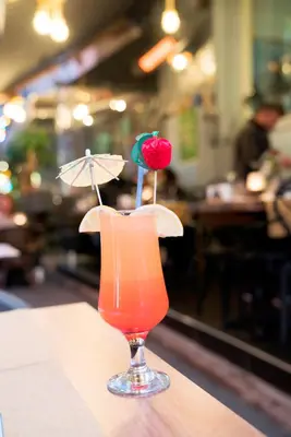 a drink in a glass sitting on a table at Hotel Agan Oldcity Istanbul in Istanbul