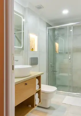 a bathroom with a toilet and a sink and a shower at Antik Hotel Istanbul in Istanbul