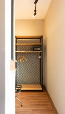a room with a closet with a door open at Antik Hotel Istanbul in Istanbul