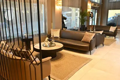 a lobby with a couch and tables in a store at Sogut Hotel Old City in Istanbul
