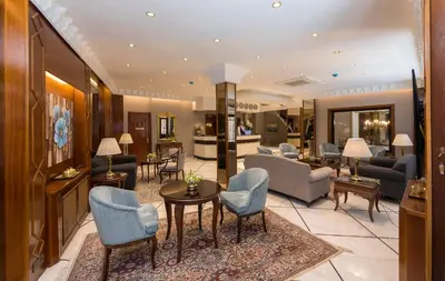 a lobby with chairs and a living room at Vardar Palace Hotel - Special Category in Istanbul