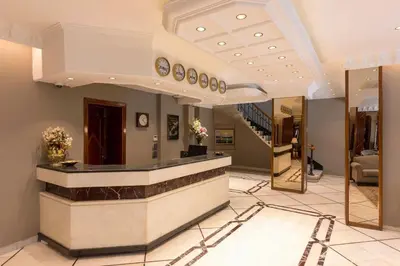 a lobby of a hotel with a reception counter at Vardar Palace Hotel - Special Category in Istanbul