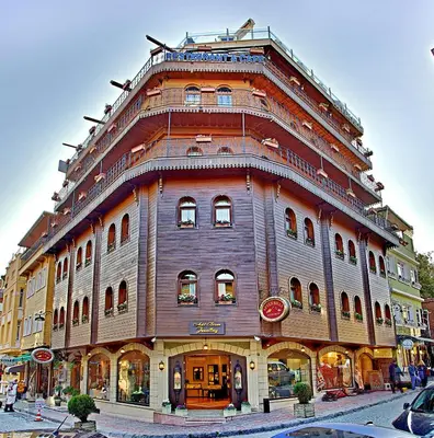 a large brown building with a round top at Seven Hills Hotel - Special Category in Istanbul