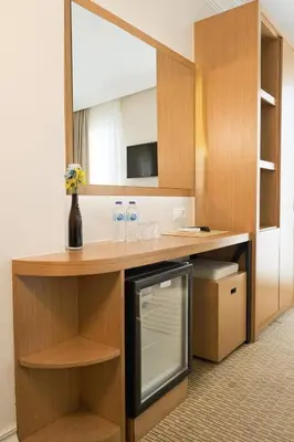 a room with a counter with a sink and a mirror at Sude Konak in Istanbul