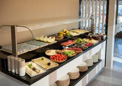 a buffet line with many different types of food at Tan Hotel - Special Category in Istanbul