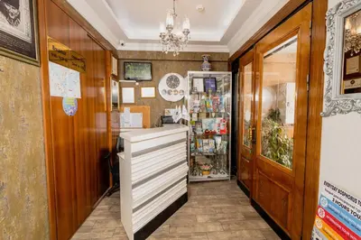 a kitchen with a counter and a refrigerator at A'la Sofia Hotel İstanbul in Istanbul