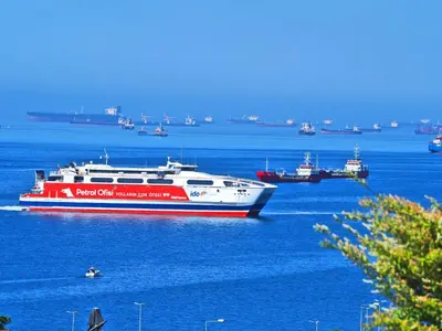 a large red and white boat in the water at The Sunrise Hotel in Istanbul