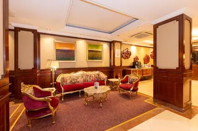 a living room with a couch and chairs and a table at Pera Rose Hotel & Spa - Special Category in Istanbul