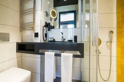 a bathroom with a sink and a shower at Trip Park Hotel in Istanbul